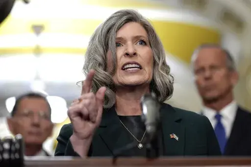 Sen. Joni Ernst, R-Iowa, talks after a policy luncheon on Capitol Hill, Sept. 24, 2024, in Washington. (AP Photo/Mariam Zuhaib, File)