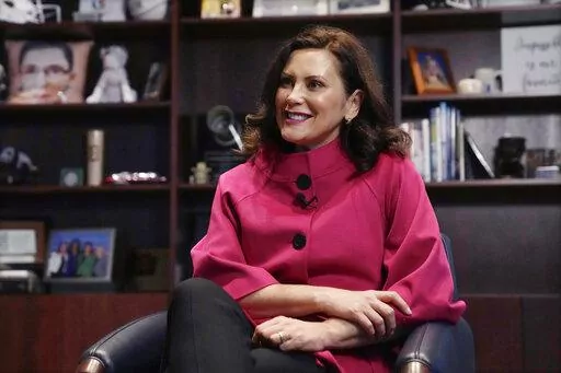 Michigan Gov. Gretchen Whitmer is interviewed by The Associated Press in her office, Nov. 17, 2022, in Lansing, Mich. Democrats will be in charge of Michigan's state government for the first time in nearly 40 years come January, raising progressive hopes of undoing decades of Republican-backed measures and advancing an agenda that includes restrictions on guns and help for the working poor. (AP Photo/Carlos Osorio, File)