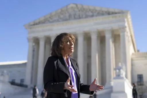 Ruth Glenn, a domestic violence survivor, speaks with The Associated Press as she discusses a case before the Supreme Court that is focused on a law aiming to keep guns out of the hands of abusers, in Washington, Monday, Oct. 23, 2023. Glenn is the president of the National Coalition Against Domestic Violence. (AP Photo/J. Scott Applewhite)