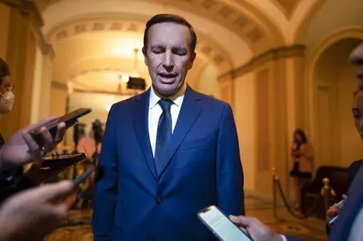 Sen. Chris Murphy, D-Conn., who has led the Democrats in bipartisan Senate talks to rein in gun violence, talks to reporters, at the Capitol in Washington, Wednesday, June 22, 2022. Senate bargainers reached agreement on a bipartisan gun violence bill yesterday, with Majority Leader Chuck Schumer predicting Senate approval later this week. (AP Photo/J. Scott Applewhite)