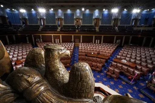 The chamber of the House of Representatives is seen at the Capitol in Washington, Monday, Feb. 28, 2022. President Joe Biden will deliver his State of the Union speech Tuesday night to a joint session of Congress and the nation. (AP Photo/J. Scott Applewhite)