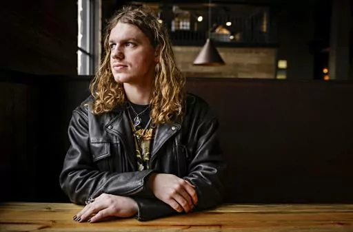 Dakota Adams poses for a photograph during an interview, Feb. 21, 2024, in Kalispell, Montana. Adams, the estranged son of Oath Keepers founder and imprisoned seditionist Stewart Rhodes, is running for the legislature in Montana as a Democrat. He said the Jan. 6, 2021 insurrection "as a whole" led to his decision to run for office. Adams is realistic about his chances of winning in the deep red northwestern corner of the state, but says he believes he can help some Republican voters see things d