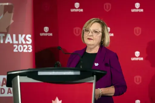 Lana Payne, Unifor national president speaks during a news conference, Aug. 29, 2023, in Toronto. Auto workers walked off the job at three General Motors facilities in Canada early Tuesday, Oct. 10, 2023 after failing to reach agreement with the automaker. (Tijana Martin/The Canadian Press via AP, File)