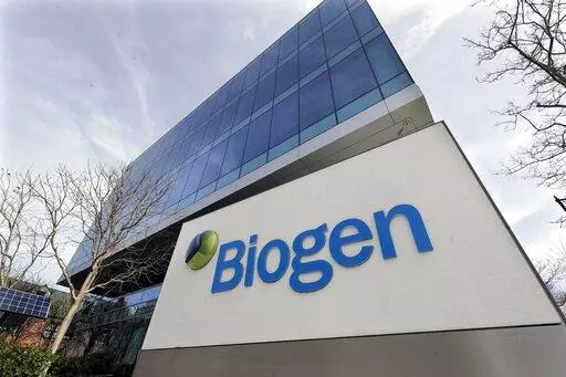The Biogen Inc., headquarters, Wednesday, March 11, 2020, in Cambridge, Mass. Medicare says it’s considering a cut in enrollee premiums, after officials stuck with an earlier decision to sharply limit coverage for a pricey new Alzheimer’s drug projected to drive up program costs.  (AP Photo/Steven Senne, File)