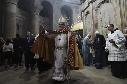 Latin Patriarch of Jerusalem Pierbattista Pizzaballa leads the Easter Sunday Mass at the Church of the Holy Sepulcher, where many Christians believe Jesus was crucified, buried and rose from the dead, in the Old City of Jerusalem, Sunday, April 9, 2023. Since the rise of Israel's most right-wing government in history, church leaders say the 2,000-year-old Christian community in Jerusalem has come under increasing attack, with an uptick in harassment of clergy and vandalism of religious propertie