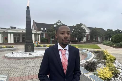Chad Preston, a senior political science major at Florida AM University, poses for a photo before class on Sept. 27, 2023 in Tallahassee, Fla. A core mission of Florida A&M University from its founding over a century ago has been to educate African Americans. It was written into the law that established the school along with another college, in Gainesville, reserved for white students. At Florida's only public HBCU, some students now fear political constraints might get in the way of teaching pa