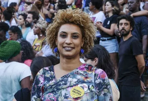 In this Jan. 9, 2018 file photo, Rio de Janeiro Councilwoman Marielle Franco smiles for a photo in Cinelandia square. Brazil’s federal police arrested on Sunday, March 24, 2024 the men suspected of ordering Franco's killing in 2018, a long-awaited step after years of society clamoring for justice. (AP Photo/Ellis Rua, File)
