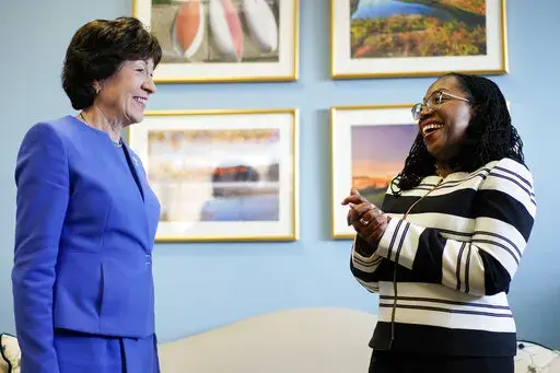 Supreme Court nominee Ketanji Brown Jackson meets with Sen. Susan Collins, R-Maine, on Capitol Hill in Washington, March 8, 2022.  Collins will vote to confirm Ketanji Brown Jackson, giving Democrats at least one Republican vote and all but assuring that she will become the first Black woman on the Supreme Court. (AP Photo/Carolyn Kaster, File)
