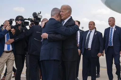 President Joe Biden is greeted by Israeli Prime Minister Benjamin Netanyahu after arriving at Ben Gurion International Airport, Wednesday, Oct. 18, 2023, in Tel Aviv. (AP Photo/Evan Vucci, File)