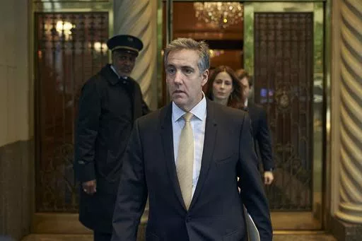 Michael Cohen departs his apartment building on his way to Manhattan criminal court, Thursday, May 16, 2024, in New York. The prosecutors’ star witness in the hush money case against former President Donald Trump is returning to the witness stand as defense lawyers try to chip away at Cohen’s crucial testimony implicating the former president. (AP Photo/Andres Kudacki)