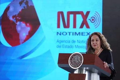 In this photo provided by the Mexican presidential press office, Notimex Director Sanjuana Martinez speaks during the daily press briefing at the National Palace in Mexico City, July 19, 2019. Mexican President Andrés Manuel López Obrador confirmed on April 14, 2023 the permanent closure of the state agency, Notimex, which has been closed since 2020 due to a labor dispute. (Mexico's Presidential Press Office via AP, File)