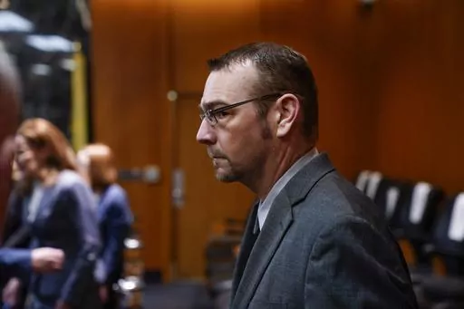 James Crumbley enters the Oakland County Courtroom of Cheryl Matthews during his trial, March 13, 2024, in Pontiac, Mich. In a court filing Wednesday, April 3, prosecutors in Michigan recommended at least 10 years in prison for Jennifer and James Crumbley, two parents who are the first in the U.S. to be held criminally responsible for a school shooting, when they're sentenced Tuesday, April 9. (Mandi Wright/Detroit Free Press via AP, Pool, File)