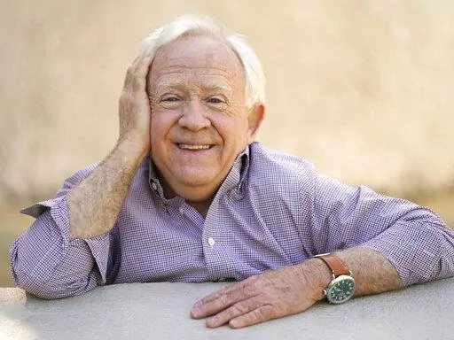 Leslie Jordan poses for a portrait at Pan Pacific Park in the Fairfax district of Los Angeles on Thursday, April 8, 2021 to promote his new book "How Y'all Doing?: Misadventures and Mischief from a Life Well Lived." Jordan, the Emmy-winning actor whose wry Southern drawl and versatility made him a comedy and drama standout on TV series including “Will & Grace” and “American Horror Story,” has died. He was 67. (AP Photo/Damian Dovarganes, File)