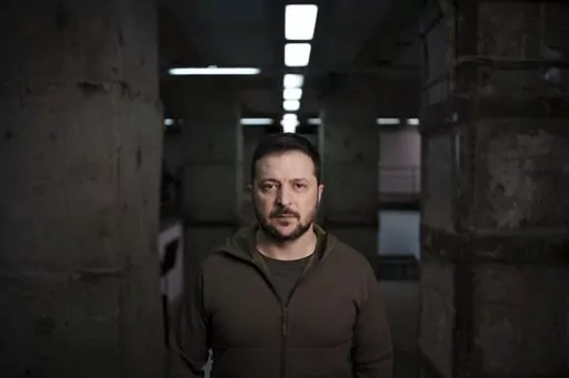 Ukrainian President Volodymyr Zelenskyy poses for a photo after his interview with The Associated Press in Kharkiv, Ukraine, Thursday, Nov. 30, 2023. Zelenskyy says the war with Russia is in a new stage, with winter expected to complicate fighting after a summer counteroffensive that failed to produce desired results due to enduring shortages of weapons and ground forces. Despite the setbacks, however, he says that "we are not backing down." (AP Photo/Felipe Dana)