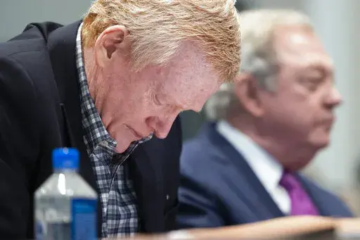 A tear drops from Alex Murdaugh's eye as he listens to his friend Chris Wilson testify during his double murder trial at the Colleton County Courthouse on Thursday, Feb. 9, 2023, in Walterboro, S.C. The 54-year-old attorney is standing trial on two counts of murder in the shootings of his wife and son at their Colleton County home and hunting lodge on June 7, 2021. (Joshua Boucher/The State via AP, Pool)