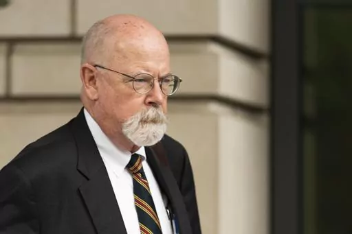 Special counsel John Durham, the prosecutor appointed to investigate potential government wrongdoing in the early days of the Trump-Russia probe, leaves federal court in Washington, May 16, 2022. Durham ended his four-year investigation into possible FBI misconduct in its probe of ties between Russia and Donald Trump’s 2016 presidential campaign. The report Monday, May 15, 2023, from Durham offers withering criticism of the bureau but a meager court record that fell far short of the former pre