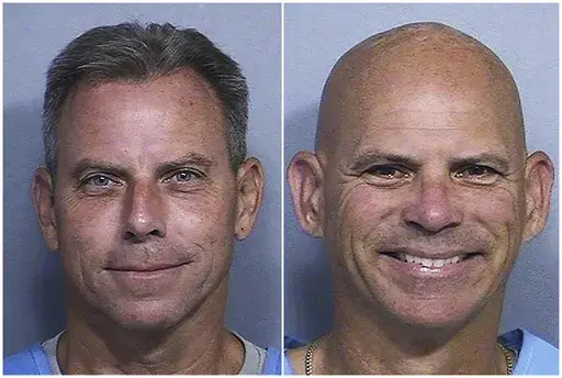 This combination of two booking photos provided by the California Department of Corrections shows Erik Menendez, left, and Lyle Menendez. (California Dept. of Corrections via AP, File)