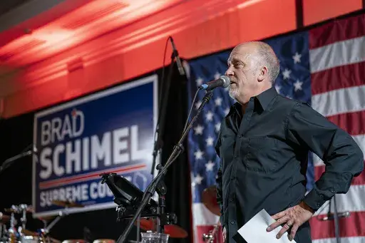 Wisconsin Supreme Court candidate Brad Schimel makes his concession speech to a crowd at his election night party Tuesday, April 1, 2025, in Pewaukee, Wis. (AP Photo/Andy Manis)