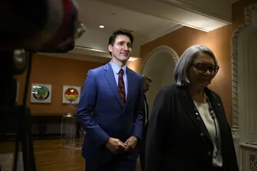 Canada's Prime Minister Justin Trudeau and Gov. Gen. Mary Simon depart after Dominic LeBlanc, not shown, was sworn in as Finance Minister during a ceremony at Rideau Hall in Ottawa, Ontario, Monday, Dec. 16, 2024. (Justin Tang/The Canadian Press via AP, File)
