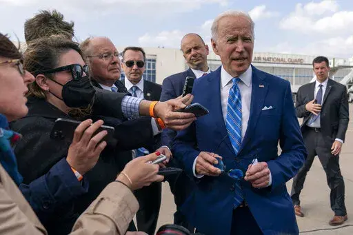 President Joe Biden speaks to the media before boarding Air Force One at Des Moines International Airport, in Des Moines Iowa, April 12, 2022, en route to Washington. Americans' international outlook has undergone a major shift in recent years. That's according to a new poll from the Pearson Institute and The Associated Press-NORC Center for Public Affairs Research. A majority now expect that U.S. relations with allies will stay the same or improve but that U.S. dealings with traditional adversa