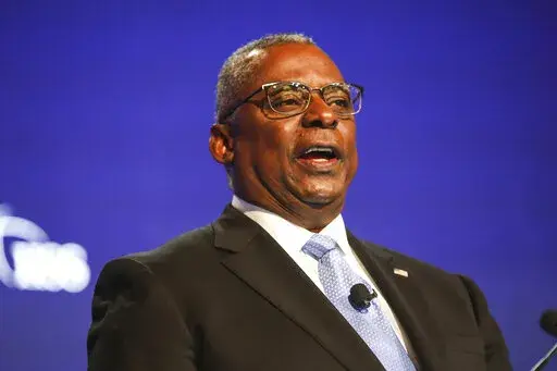 U.S. Defense Secretary Lloyd Austin speaks during a plenary session at the 19th International Institute for Strategic Studies (IISS) Shangri-la Dialogue, Asia's annual defense and security forum, in Singapore, Saturday, June 11, 2022. (AP Photo/Danial Hakim)
