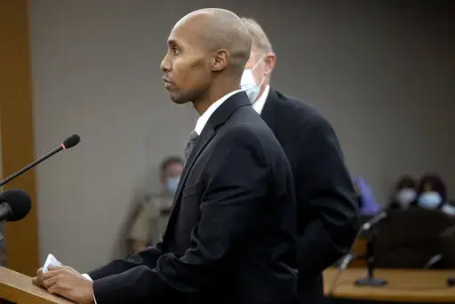 Former Minneapolis police officer Mohamed Noor addresses Judge Kathryn Quaintance at the Hennepin County Government Center, Thursday, Oct. 21, 2021, in Minneapolis. Noor, who fatally shot a woman who called 911 to report a possible sexual assault behind her home in 2017, is scheduled to be released from incarceration on Monday, June 27, 2022. (Elizabeth Flores/Star Tribune via AP, Pool, File)