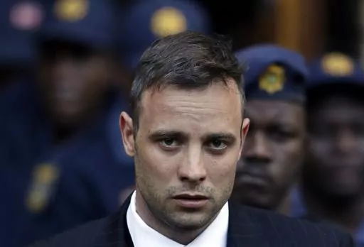 Oscar Pistorius leaves the High Court in Pretoria, South Africa, Wednesday, June 15, 2016, after his sentencing proceedings. Pistorius could be granted parole on Friday, Nov. 24, 2023 after nearly 10 years in prison for killing his girlfriend. The double-amputee Olympic runner was convicted of a charge comparable to third-degree murder for shooting Reeva Steenkamp in his home in 2013. He has been in prison since late 2014. (AP Photo/Themba Hadebe, File)