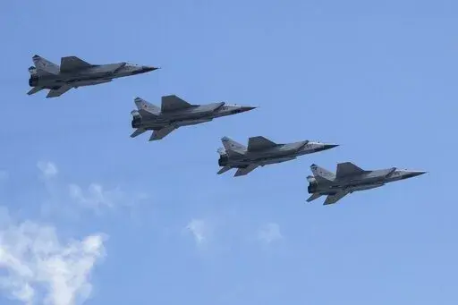Russian's Air Force Mikoyan MiG-31K jets carrying Kh-47M2 Kinzhal nuclear-capable air-launched ballistic missiles fly over Red Square during a rehearsal for the Victory Day military parade in Moscow, Russia, on May 7, 2021. As Russia bombarded Ukraine this week, military observers were left wondering about how many and what types of missiles Russia still has in its arsenal. In other words, how long can the Kremlin keep up the barrage? (AP Photo, File)