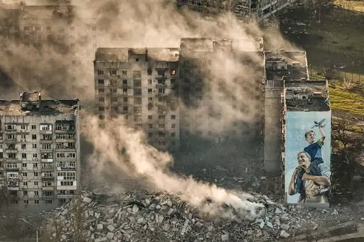 Smoke rises from a building in Bakhmut, site of the heaviest battles with the Russian troops in the Donetsk region, Ukraine, April 26, 2023. The GOP has been softening its stance on Russia ever since Donald Trump won the 2016 presidential election following Russian hacking of his Democratic opponents. The reasons include Russian President Vladimir Putin holding himself out as an international champion of conservative Christian values, the GOP's growing skepticism of international entanglements a