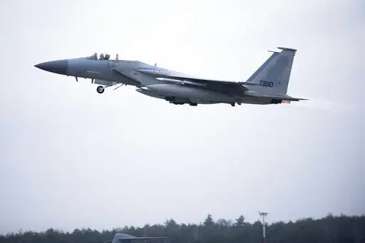 In this image provided by the U.S. Air Force, a U.S. Air Force F-15C Eagle assigned to the 493rd Fighter Squadron, Royal Air Force (RAF) Lakenheath, takes off in support of North Atlantic Treaty Organization enhanced air policing missions with the Polish Air Force at Lask Air Base, Poland, Feb. 15, 2022. Russia's attack on Ukraine's Zaporizhzhia nuclear power plant has renewed calls for NATO to impose a no-fly zone over Ukraine, despite the repeated rejection of the idea by western leaders conce