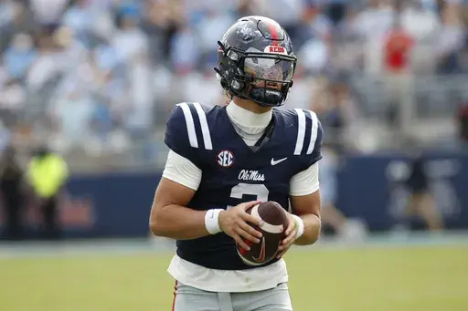 Mississippi quarterback Jaxson Dart (2) stands on the field during a timeout in the second half of an NCAA college football game against Oklahoma, Saturday, Oct. 26, 2024, in Oxford, Miss. (AP Photo/Sarah Warnock)