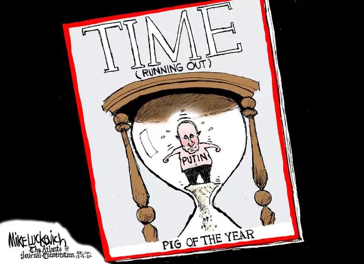 Mike Luckovich for Dec 09, 2022