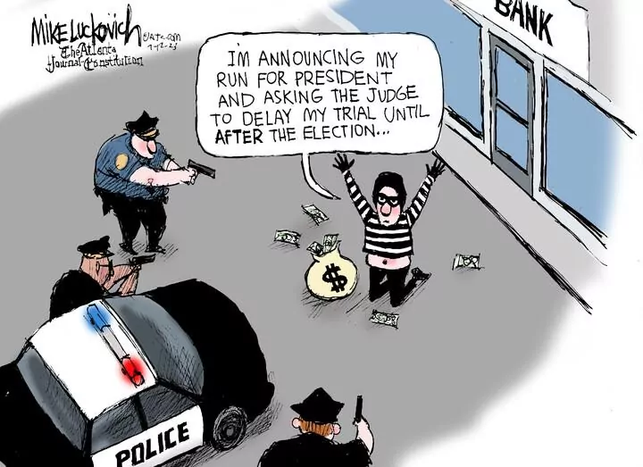 Mike Luckovich for Jul 12, 2023